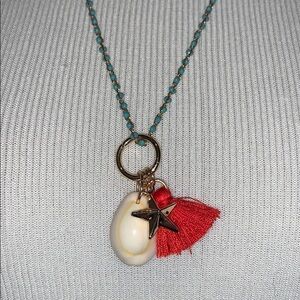 Long shell necklace, beaded, gold, charms included